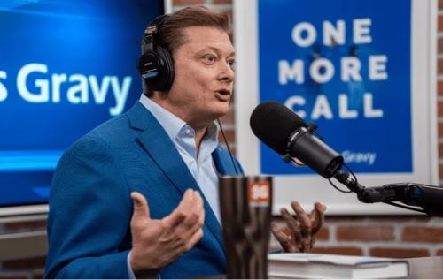 Image of Jeb Blount recording a sales training podcast episode in the Sales Gravy podcast studio.